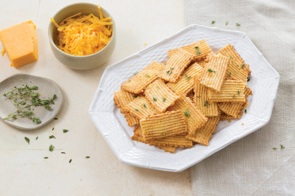 herbed cheese straws on a serving platter