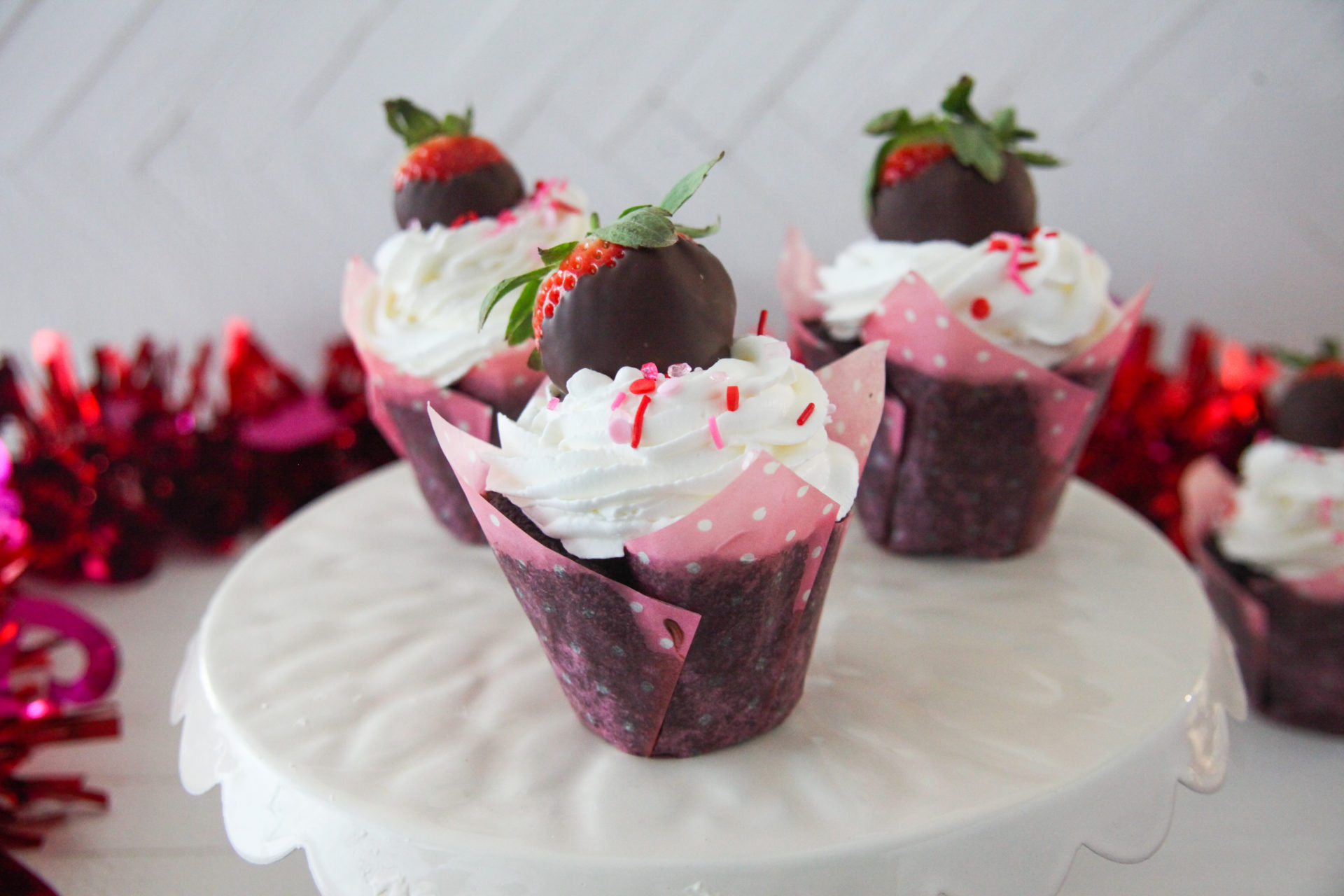 Chocolate Cupcakes Topped With Chocolate-Dipped Strawberries