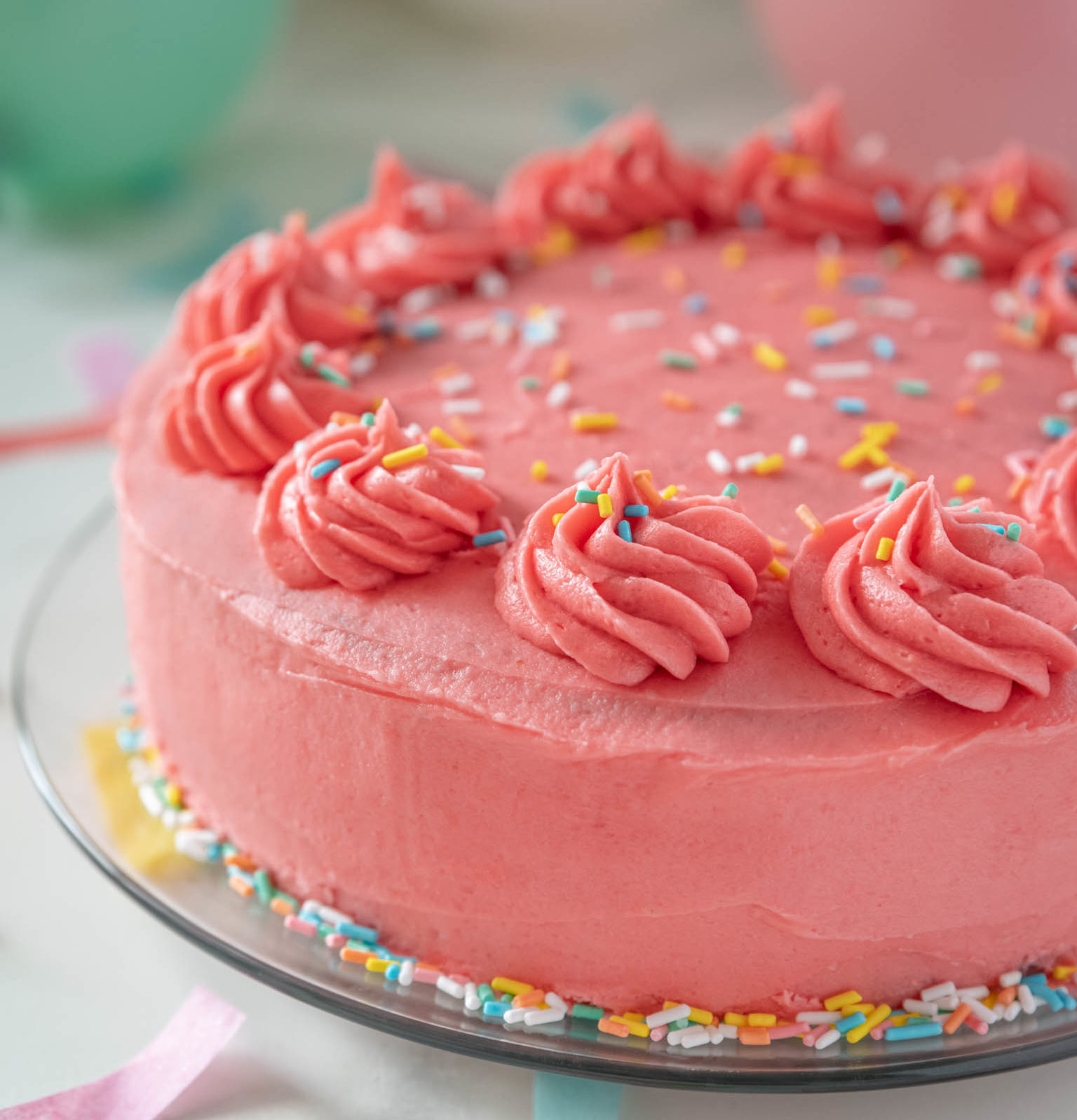 Pink Frosted Cake With Sprinkles