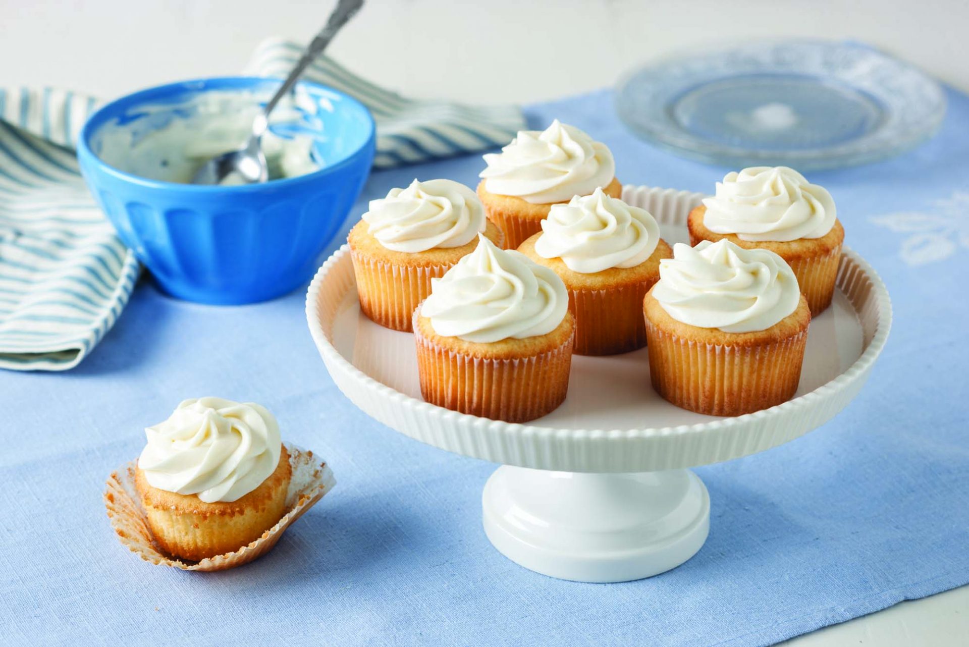 Vanilla-Frosted Cupcakes On Cake Stand