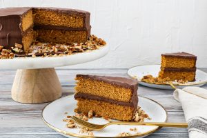 Slice of Spice Cake with whole cake in background