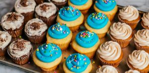 cupcakes with blue frosting and sprinkles