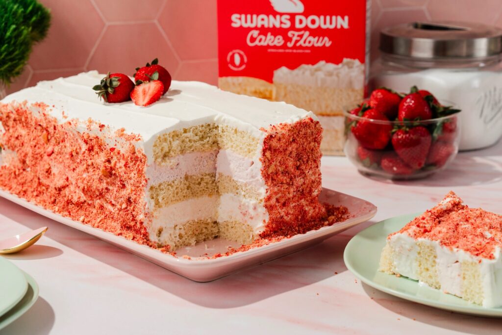 strawberry crunch ice cream cake on serving plate